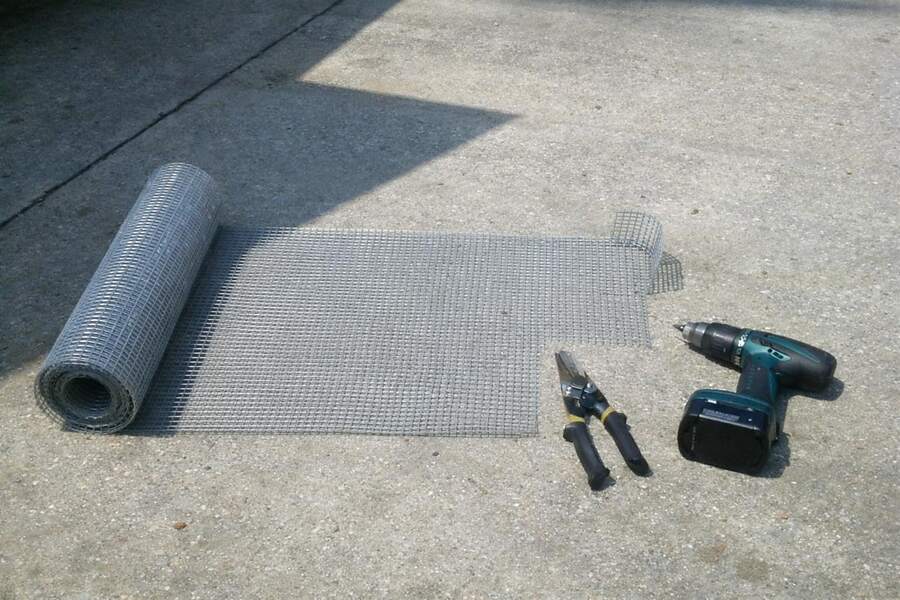 A roll of galvanized wire mesh of the kind used to close soffit and eave gaps