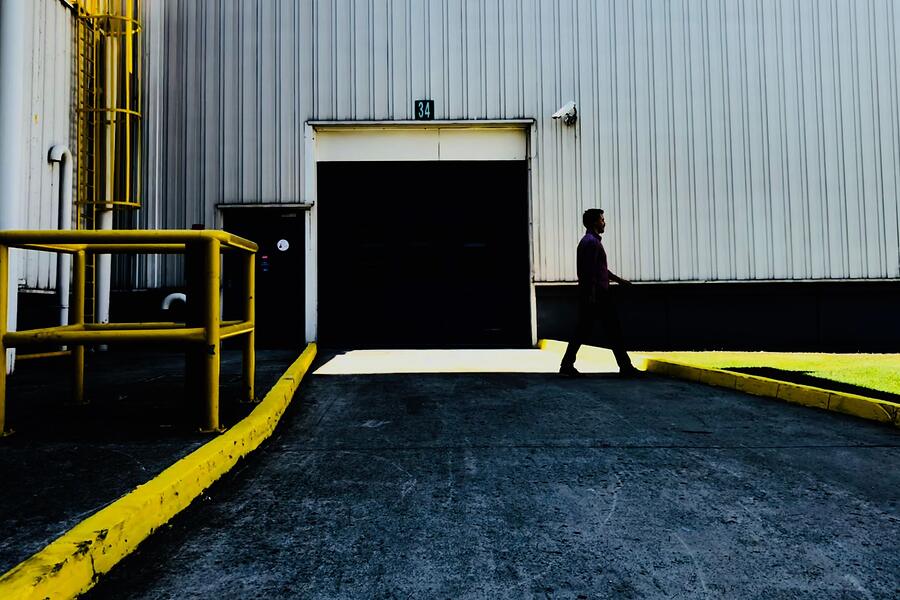 Warehouse buildings with roll-up doors in an industrial district